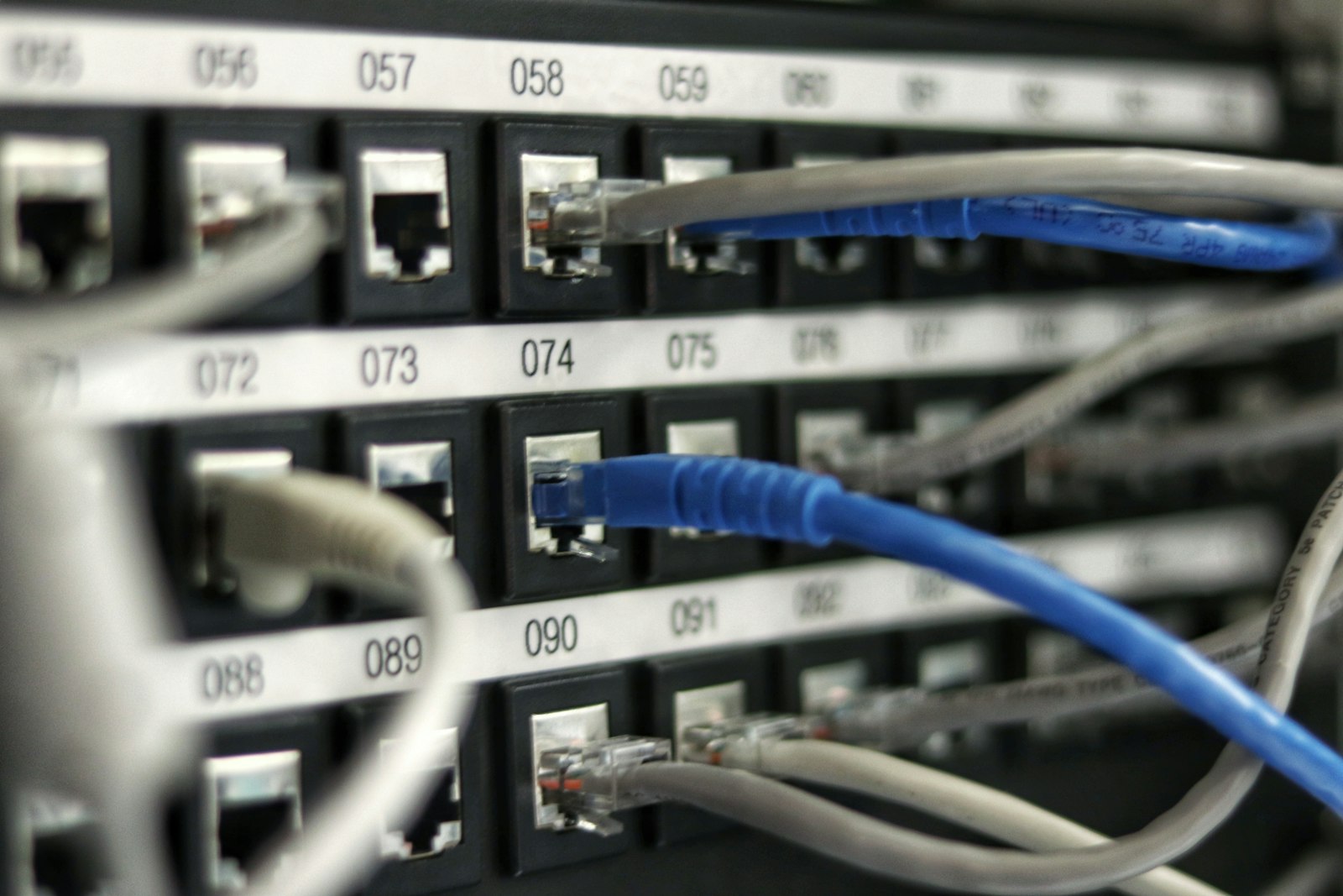 Network switch with illuminated ports and patch cables